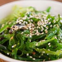 Seaweed Salad · Sesame-infused seaweed salad.