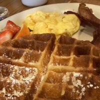 Belgian Waffle Combo · Served with two eggs any style and your choice of meat.