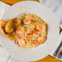 Prawn Fettuccini Alfredo · Fettuccine & garlic prawns tossed in creamy alfredo sauce - topped with parmesan cheese. 16.95