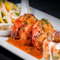 Camarones A La Diabla · Delicious fresh prawns with onions, bell peppers and mushrooms in a sweet and spicy red sauc...