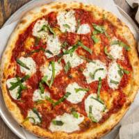 Margherita Pizza · San Marzano tomato sauce, fresh mozzarella, fresh basil, topped with olive oil.