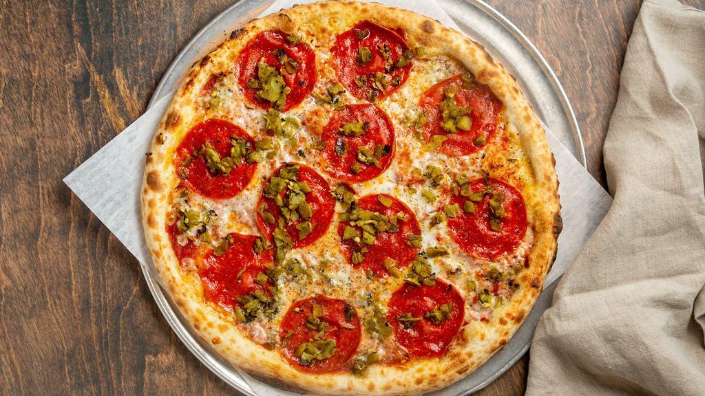 The Red Feather Pizza · San Marzano tomato sauce, pepperoni, mozzarella, roasted Anaheim peppers.