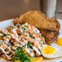 Smoked Salmon Hash · House smoked salmon, red potatoes, butternut squash, grilled leeks, jack cheese, two poached...