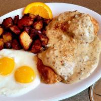 Cadillac Biscuits & Gravy · Housemade buttermilk biscuits, country sausage gravy, and Cadillac potatoes.