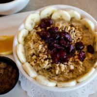 Oatmeal · Bobs red mill oats, bananas, dried cranberries, brown sugar, and roasted Oregon hazelnuts.