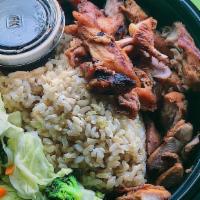 Steak And Chicken Combo · Served with steamed vegetables, our own teriyaki sauce and a choice of brown rice, white ric...