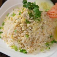Crab Fried Rice · Dungeness crab meat stir-fried with jasmine rice, eggs, and onions