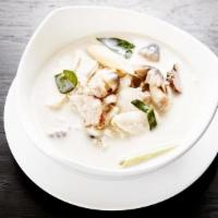 Tom Kah Soup · An individual size of coconut milk soup with straw mushroom caps, lemongrass and galangal ro...