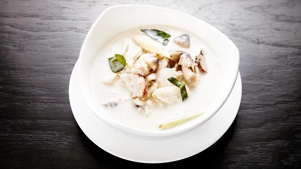 Tom Kah Soup · An individual size of coconut milk soup with straw mushroom caps, lemongrass and galangal root.