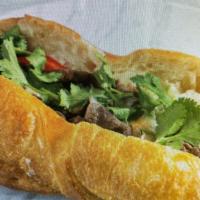 Steak Sandwich · Most popular. Thinly sliced steak with mayo, cucumber, tomato, onions, jalapenos  cilantro a...