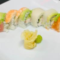 Rainbow · Inside: avocado, cucumber, crab salad. Outside: four types of fish and ponzu sauce. Contains...