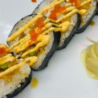 Dragonfly · Inside: tempura shrimp, tempura asparagus, and crab salad. Outside: spicy mayo, eel sauce, a...
