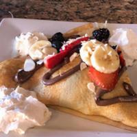 The Foch Crêpe · Banana, Nutella, mixed berries, and almonds.