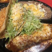 #6 Chicken Taco And Chicken Enchilada · Chicken taco with lettuce and cheese.
Shredded chicken (cooked with tomato, onion, and bell ...