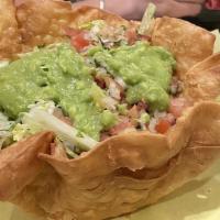 Taco Salad · Beans, choice of meat, lettuce, guacamole, sour cream, cheese and pico de gallo.