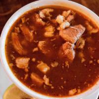 Pozole  (24Oz) · A hearty and savory pork broth cooked with chunks of pork, white corn hominy and spices. Ser...