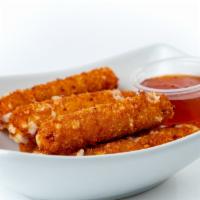 Mozzarella Sticks · Fresh, hand breaded. Served with our house pepper jelly or marinara.