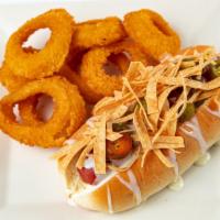 Stadium Dog · 1/4 lb dog served with white queso, jalapeños & topped with crushed tortilla chips, served w...