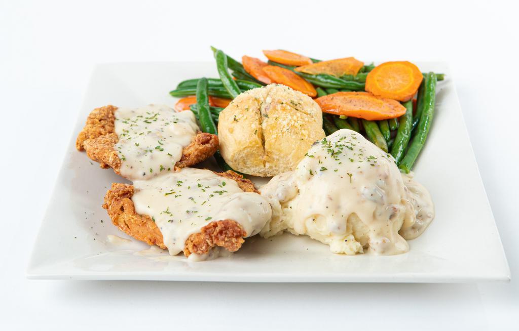 Country Fried Steak Or Chicken · Chicken fried steak or chicken, served with fresh mashed potatoes & vegetable medley & dinner roll. Choose between home-style country gravy or beef gravy.