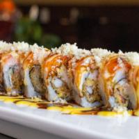Kenji Maki Roll · Soft shell crab, kani, topped w/ salmon, spicy lobster, crunch & special sauce