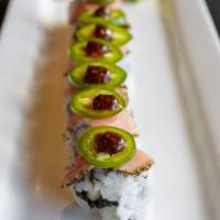Crazy Roll · Yellowtail, cucumber, avocado, topped with black pepper tuna and jalapeño.