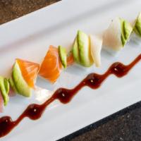 Rainbow Roll · Kani, cucumber, avocado topped with assorted fish.