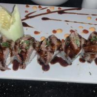 Kobe Beef Roll · Tempura shrimp and kani topped with kobe beef.