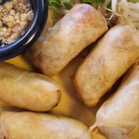 Fried Pad Thai Spring Rolls · Eggs, glass noodles, cabbage, carrots, seasoned with our pad Thai sauce, then tucked in spri...