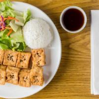 Tofu Teriyaki · Vegetarian meal. Served with fresh salad and steamed rice.