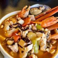 Caldo 7 Mares · Shrimp, squid, fish, scallops served with vegetables in a delicious soup. No rice no beans.