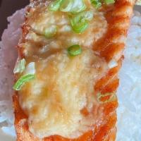 Golden Salmon Entrée · Salmon baked with dynamite sauce, comes with miso soup, house salad, steamed rice, four piec...