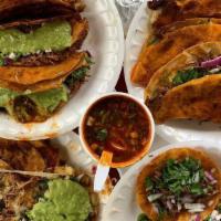 Quesotacos · Large corn tortilla with your choice of meat with cheese.  Topped with cilantro, onion and s...