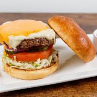 Da Bomb Burger · 6 ounce Creekstone fresh burger with lettuce, tomato, pickle, onion topped with melted Ameri...