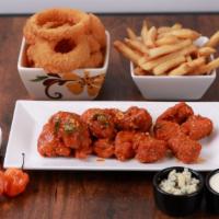 Boneless Wings - 6 Pieces · (6) Large all white meat Boneless Wings. Served with a side of Ranch. Choice of: Naked, Hone...