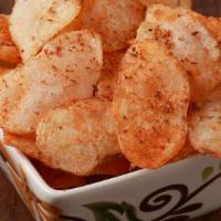 Potato Chips  · Made fresh when ordered.  Get them salted or a touch of spice with cajun seasoning.