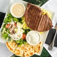 Gyro Plate · Grilled beef and lamb mix served with basmati rice, pita bread, tzatziki sauce, hummus and g...