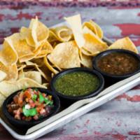 Chips & Salsa · Charred tomato salsa, roasted tomatillo salsa, pico de gallo.