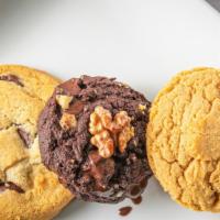 Homemade Cookies · Freshly baked three cookies assortment. Chocolate chip, double chocolate chip, and peanut bu...