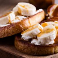 French Toast-Banana-Chantilly-Caramelized Nuts · Our version of The French toast made with our cinnamon dip , Fresh banana, Homemade Chantill...