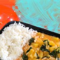 Pineapple Curry · Red curry with coconut milk, pineapple, tomatoes, bell pepper, and basil leaves.