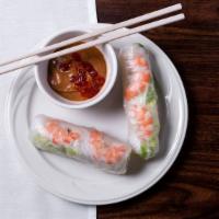 Spring Rolls (2) · Rice paper wrap filled with steamed shrimp, pork, lettuce, bean sprouts, and rice noodles.