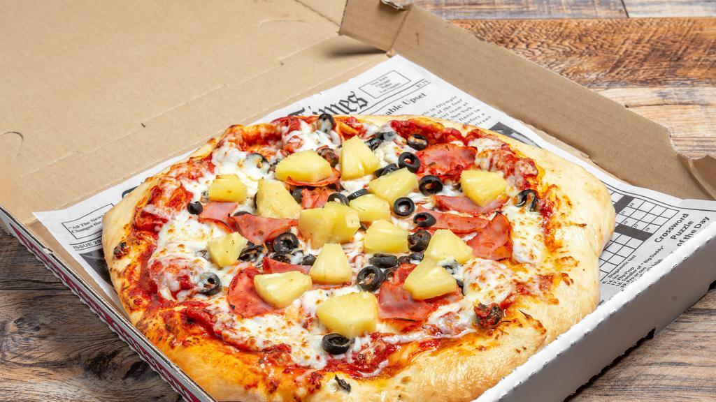 Hawaiian Pizza · Our fresh in house made dough covered with our in house made sauce with diced pineapples, black olives and sliced Canadian ham smothered with mozzarella cheese.