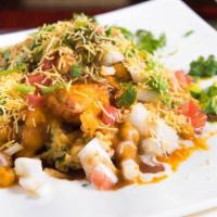 Bhel Puri · Mixture of puff rice, potatoes, tomatoes, onions, crushed puri's mixed with tamarind chutney...