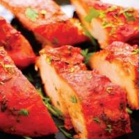 Chicken Tikka · Smoked boneless chicken breast marinated in fresh spice.