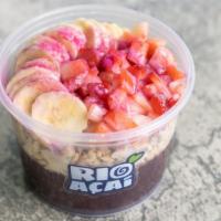 The Rio · Authentic acai base topped with granola, strawberries, banana, sweetened condensed milk, and...