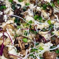 Truffle N' Mushroom · white sauce, cremini and oyster mushroom, vegan mozzarella, truffle oil, vegan parmesan, herbs