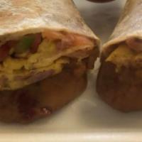 Breakfast Burrito · flour tortilla, 3 Eggs, tomato, onion, jalapeños
 
with your choice of meat- chorizo, ham, b...
