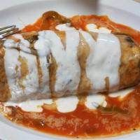 Wet Breakfast Burrito · The breakfast burrito with your choice of meat, eggs, hashbrown, and cheese covered with the...