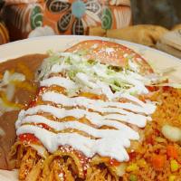 Enchilada Plate · Three enchiladas with your choice of filling, sour cream, lettuce, and tomato. Served with r...