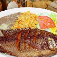 Mojarra Plate · Mojarra (fish) served with rice, beans, your choice of tortillas (three), and a side salad.